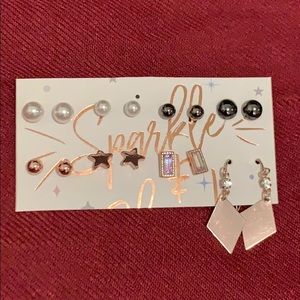 8 sets of earrings. With two FREE rings!!